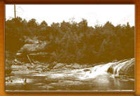 bathers in pool below Muddy Creek Falls