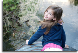 Young girl learning about water quality