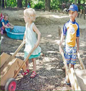 Playing with Wheelbarrows at Acorn Hill