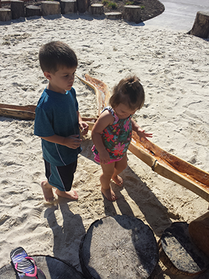 Children playing in sand pit at Constitution Gardens Park