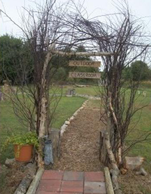 Tree Branch Outdoor Classroom Entrance at Friends Forever Learning Center