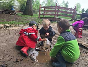 Exploring with loose parts at Irvine Nature Center