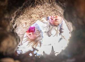 Exploring hollow tunnels at Irvine Nature Center