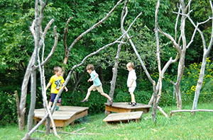 Playing on Wooden Platforms at Lucy School