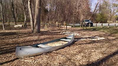 canoe made into a sandbox