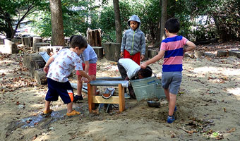 Kids at an activity center at Acorn Hill