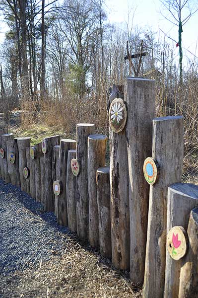 posts set for balancing and climbing, sinage and art are afixed to the posts