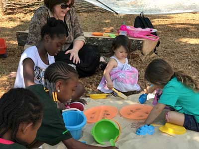 kids playing in a sand box