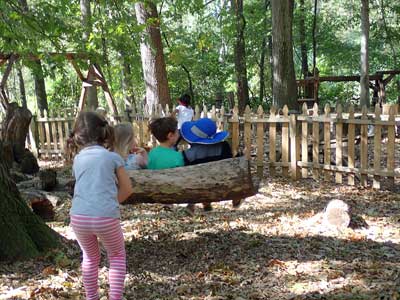 kids playing on a swing