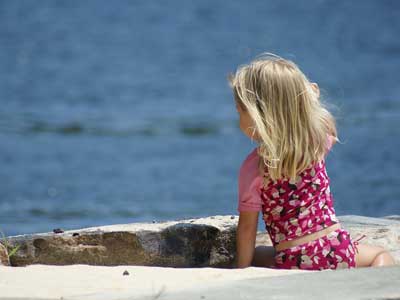 Girl by a river