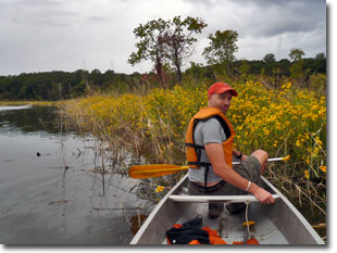 Guy fishing in 1 of 5 fishing ponds open to public at Merkle State Park