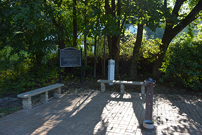 Plaque along Torrey C. Brown Rail Trail