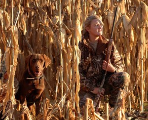 Photo of hunter and dog