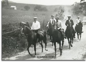 Warren G. Harding, Harvey Firestone, Thomas Edison and Henry Ford horseback riding through Maryland during a camping trip in 1921.