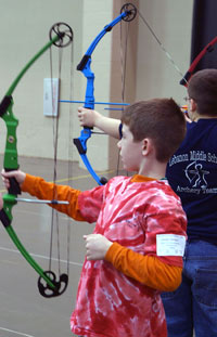 Young male students with bows, courtesy of Doug Oatman