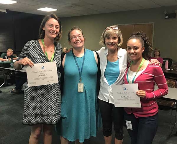 Recent Maryland Naturalists holding their certificates with DNR Staff