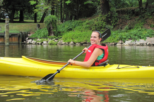 Woman kayaking.